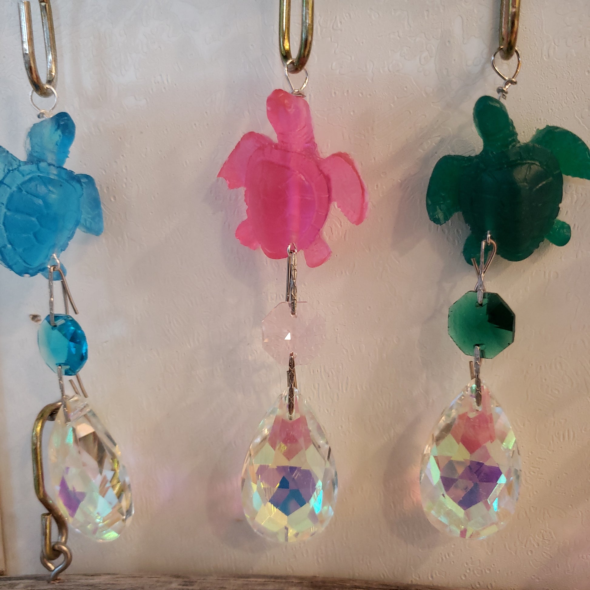 light pink epoxy resin sea turtle sun catching chandelier crystal