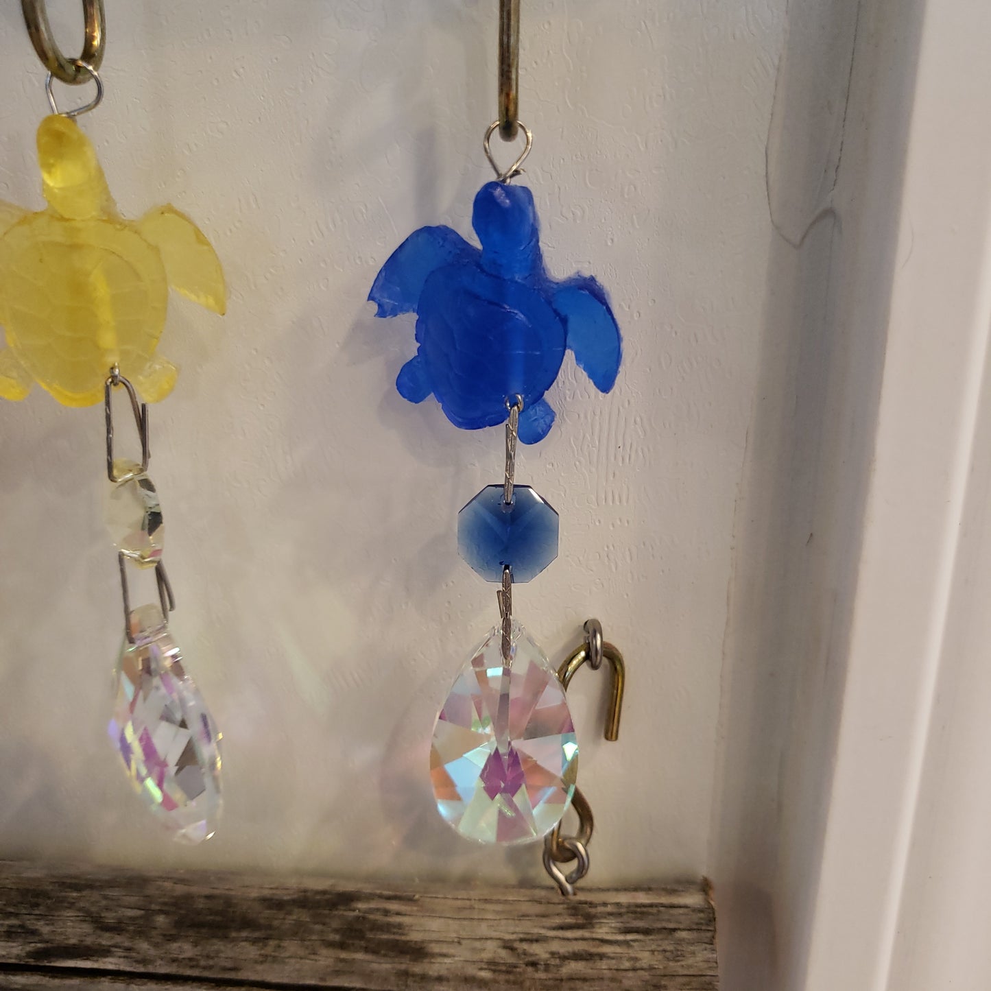 dark blue epoxy resin sea turtle sun catching chandelier crystals