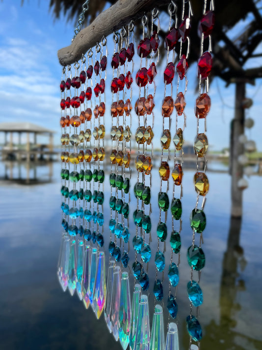 chandelier crystal sun catching rainbow drape by Dazzling Driftwood