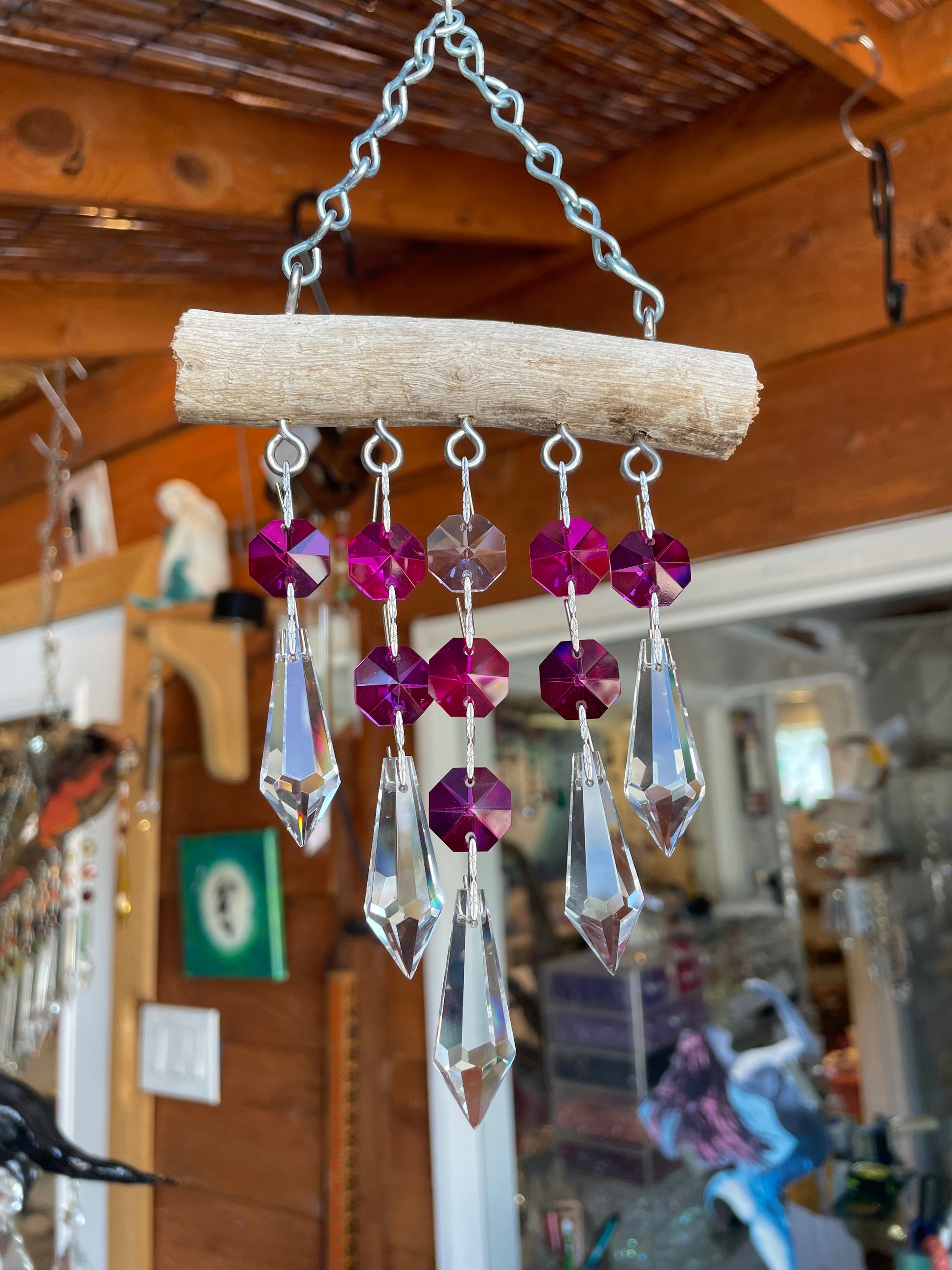 natural driftwood sun catching chandelier crystals magenta, pink, clear