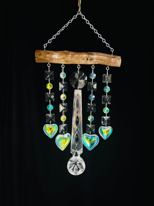 Driftwood and Crystal Sun catching windchime featuring heart shaped crystals